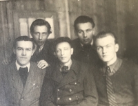 Miloslav Jiroš with friends, first from left below